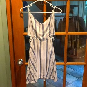 Hollister small dress. Cut out detail on sides. Elastic back. Spaghetti straps.